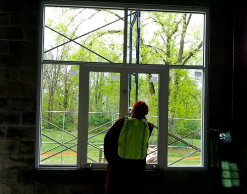 Lama Norlha Rinpoche Inspects Windows 