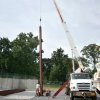 First Steel Column Being Raised